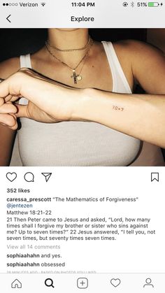 a woman with a cross tattoo on her arm, and the caption below it