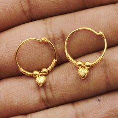 Discover the allure of Handmade Gold Jewelry at https://morvijewels.etsy.com/   Get a dazzling 25% off on all our 22k and 18k gold pieces. Don't miss out on this limited-time offer. Shop now and embrace the radiance of gold!Beautiful yellow gold earrings  Gold Purity- 20k yellow Gold Length - 2  cm Width - 1.8 cm Weight - 1.4 grams approx Click here  https://morvijewels.etsy.com/    to get more discount and offers Happy to take wholesale bulk orders. Temple Jewelry Round Hoop Earrings For Celebration, Temple Jewelry Style Round Hoop Earrings For Celebration, Gold Earrings For Puja, Traditional Small Hoop Earrings For Anniversary, Hoop Nose Rings For Anniversary, Traditional Small Hoop Earrings For Anniversaries, Small Hoop Nose Rings For Wedding, 22k Gold Earrings For Puja, Yellow Gold Round Hoop Earrings For Celebration