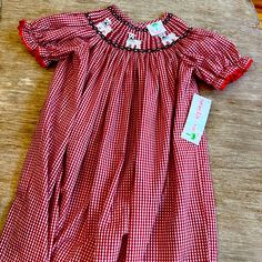 Girls Size 7, Shrimp And Grits Smocked Dress. New With Tags, And Adorable For Summer And Fall Red Cotton Dress With Smocked Back, Fitted Red Cotton Smocked Dress, Red Fitted Cotton Smocked Dress, Red Smocked Dress With Ruffles And Short Sleeves, Red Cotton Smocked Dress With Smocked Bodice, Red Cotton Smocked Dress, Red Casual Smocked Dress With Smocked Cuffs, Red Casual Smocked Dress With Cuffs, Casual Red Smocked Dress With Smocked Cuffs