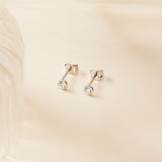 Classic and elegant, our Crystal Solitaire Stud Earrings are a timeless staple. A dazzling must-have for any jewellery lover who's ready to elevate their ear-stack. The possibilities are endless.&nbsp;18K Champagne Gold Plated or 925 Sterling SilverDiameter Zircon: 4mmSent with love in a complimentary gift box Ear Stack, Solitaire Studs, Champagne Gold, Jewelry Lover, Layering Pieces, Stud Earrings, Thing 1, Crystals