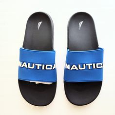 Finish Off A Summer Look With The Yavo Slide Sandal From Nautica. This Pair Is A Classic, Traveling From The Pool To The Beach, Or Wherever You Go, With Ease Features Synthetic Upper Slip-On Round Open Toe Synthetic Lining Eva Sole Imported Brand New Without Box Blue Slides For Beach Season, Blue Summer Slides For Beach Season, Casual Blue Flip Flops For The Beach, Casual Blue Flip Flops, Blue Slides For Beach Vacation, Summer Blue Slides For Vacation, Navy Sandals For Summer Beach Season, Blue Flip Flops For Beach Season, Blue Flip Flops For Swimming And Beach Season