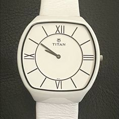 For Sale Is A Super Rare Preowned Unworn White Titan Ceramic Quartz Watch Made In India. Case Size Is Approx. 44mm And The The White Genuine Leather Band Is Stunning And Watch Is Unisex For Man Or Woman. Very Well Made, Good Quality And This Is A Discontinued Impossible To Find Model. Unisex Style! The Battery Needs To Be Replaced By Your Local Jeweler. White Leather Watch With Rectangular Dial, White Leather Watch With Analog Display, White Leather Watch Accessories With Metal Dial, White Watch Accessories With Leather Strap And Round Dial, White Leather Analog Watch, White Leather Strap Watch Accessories With Round Dial, White Leather Strap Watch For Everyday Use, White Watch With Subdials For Everyday Use, White Watch With Leather Strap