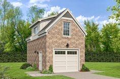 a two story brick house with a garage