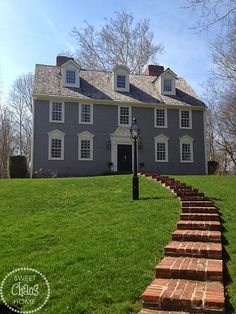 a house with steps leading to the front door