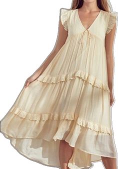 Flowy V-neck Midi Dress With Lace Trim, Chic Tiered Maxi Dress With Lace Trim, Flowy V-neck Sundress With Lace Trim, Spring Tiered Maxi Dress With Lace Trim, Flowy Tiered Cream Maxi Dress, Cream Tiered Flowy Maxi Dress, Summer A-line Maxi Dress With Lace Trim, Chic Flowy Boho Dress With Ruffles, Flowy Bohemian Midi Dress With Flutter Sleeves