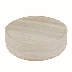 a round wooden object on a white background