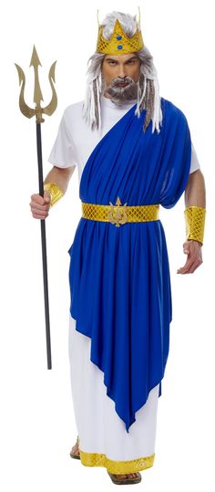 a man dressed in blue and white is holding a staff while wearing a gold crown