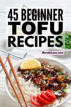 a white bowl filled with rice and meat next to chopsticks