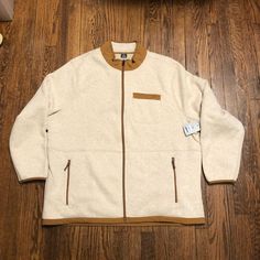 Nwt! George Fleece Jacket In Cream With Tan Accents. Full Zip Front, 1 Chest Pocket, 2 Side Zip Pockets. Beige Fleece Outerwear For Outdoor, Beige Fleece Jacket With Fleece Lining For Outdoor, Beige Fleece Jacket For Cold Weather, Beige Fleece Jacket With Pockets, Black Patagonia Jacket, Black Hooded Jacket, Jean Jacket Men, Coat Trends, Mens Thermals