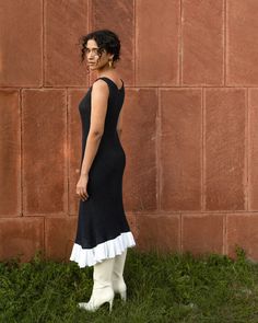 A classic yet edgy midi knit dress in dark royal blue, with contrast ruffle details at the hemline. This dress has been constructed using recycled cotton and poly yarns, that have been azo-free dyed. The model is wearing size S. 🌸 〰️〰️〰️ 🌸 〰️〰️〰️ 🌸 Care and Composition 100% Knit Cotton. Recycled Polyester Yarns. Dry clean/Hand wash in cold water. Mild liquid detergent only. Do not soak or wring. Designed & Made in India. Royal Blue Midi Dress, Midi Knit Dress, Dark Royal Blue, Sustainable Clothing Brands, Polyester Yarn, Knit Midi Dress, Blue Midi Dress, Sustainable Clothing, Online Clothing Stores