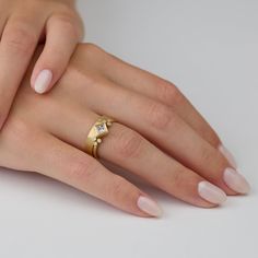 This lovely 4mm hammered band is a special yet classic choice as a wedding or commitment band. The hammered texture is both organic and refined. It stands alone, or stacks wonderfully with other rings in our collection. Matte finish. Shown in 18k yellow gold, this ring is available in white gold or platinum upon request. Delicate Hammered Yellow Gold Ring, Gold Hammered Stackable Rings For Promise, Elegant Hammered Stackable Rings In Recycled Gold, Wedding Hammered Diamond Jewelry, Modern Stackable Rings In Recycled Gold For Anniversary, Elegant Hammered Stackable Promise Rings, Modern Recycled Gold Stackable Rings For Anniversary, Hammered 14k Gold Stackable Wedding Rings, Modern Hammered Stackable Rings For Anniversary