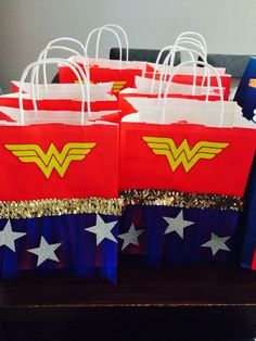 bags with wonder woman logos and stars on them