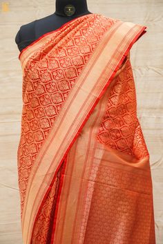 Experience the luxurious elegance of our Katan Silk Tanchoi Sarees, handcrafted with intricate Banarasi designs and premium Katan silk fabric. Available in a range of colors and styles, these sarees are the perfect choice for any special occasion Traditional Orange Banarasi Silk Pre-draped Saree, Banarasi Silk Pre-draped Saree With Zari Weaving, Orange Tussar Silk Traditional Drape, Orange Tussar Silk Festive Saree, Orange Tussar Silk Traditional Wear, Orange Tussar Silk Saree For Festive Occasion, Silk Pre-draped Saree With Zari Weaving For Puja, Festive Orange Tussar Silk Saree, Orange Tussar Silk Saree With Zari Weaving