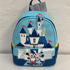 Disney Mickey Minnie Mini Backpack Loungefly Nwt Disneyland 65th Anniversary Disney Leather Backpack For Disney Trips, Blue Themed Back-to-school Bag, Blue Themed School Bags, Themed Blue School Bags, Blue Disney Backpack For Travel, Blue Disney Backpack For Daily Use, Blue Disney Backpack With Adjustable Strap, Mickey Mouse Standard Backpack For Disney Trips, Blue Disney Travel Backpack