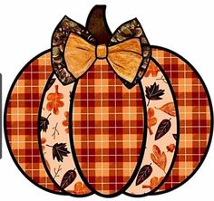 a plaid pumpkin with a bow on it