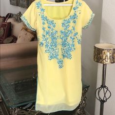 Embroidered Top,Shirt,Chiffon..Has Sequins And Turquoise’s Grey Embroidery.Beautiful And Brand New Embellished Georgette Kurta For Summer, Festive Yellow Embellished Kurta, Summer Georgette Kurta With Mirror Work, Spring Bollywood Style Embellished Kurta, Semi-stitched Spring Dresses With Mirror Work, Spring Semi-stitched Dress With Mirror Work, Embroidered Short Sleeve Dress For Festive Occasions, Yellow Straight Kurta Dress With Intricate Embroidery, Yellow Straight Kurta Dress With Floral Embroidery