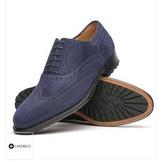 Caporicci 921 Suede Wingtip Oxfords Blue Was: $875.00 Smooth Suede Wingtip Oxfords With Brogue Detailing, Featuring Fine Stitch Detailing And Leather Sole. Excellent Craftsmanship And Top Of The Line Construction In Every Caporicci Shoe. Made In Italy Classic Blue Oxfords With Brogue Detailing, Classic Blue Oxfords With Rubber Sole, Classic Blue Cap Toe Leather Shoes, Classic Blue Wingtip Oxfords, Classic Navy Oxfords With Brogue Detailing, Blue Wingtip Leather Shoes With Rubber Heel Cap, Blue Goodyear Welted Oxfords For Work, Classic Blue Dress Shoes With Brogue Detailing, Elegant Blue Oxfords For Workwear