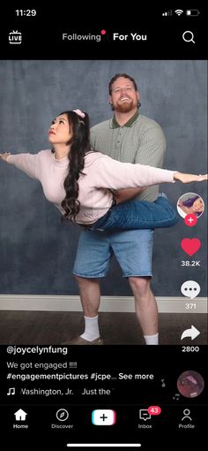 a man and woman standing in front of a blackboard with the caption's on it