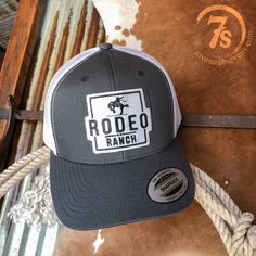 Dark grey Rodeo Ranch hat. Black and white Rodeo Ranch center patch. White mesh back. Adjustable snap back. Adjustable bill. Gray Trucker Hat With Logo Patch, Gray Trucker Hat With Logo Patch And Curved Bill, Ranch Hat, The Boyfriends, Cowgirl Accessories, Flat Bill Hats, Country Lifestyle, Country Stuff, Jeans Boots