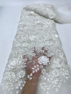 High quality 3D lace you can't go wrong with, ideal for making fashion dresses for special occasions like wedding dresses, bridal dresses, party and evening show dresses, bridesmaids dresses, prom dresses, mother of the bride and many more fashion uses. Product Type:Lace Material: Polyester  Decoration:Beads  Width:51-52 inches  Technics:Floral  Fabric Type: Tulle  Size:5 yards one piece Feature:Eco-Friendly, Elastic, water soluble  Shipping term :Within 3-7 days by DHL or Fedex Advantage:Quick Nigerian Party, African Wedding Jewelry, Mesh Embroidery, White Lace Fabric, Beaded Lace Fabric, Lace Fabrics, Beaded Tulle, Womens Wedding Dresses, Wedding Dress Fabrics