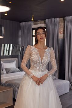 ❤ ABOUT DRESS Experience the epitome of bridal elegance with our stunning A-Line wedding gown, crafted to perfection for your special day. This dress features a beautifully designed sheer lace bodice that complements the plunging V-neckline, exuding a touch of romantic allure. The long, graceful sleeves add a timeless quality, while the intricate lace details create a luxurious feel. Cinched at the waist, the gown flows into a lustrous satin skirt, promising a flattering silhouette. The seamless Aline Lace Wedding Dress Kleider, Bridal Elegance, Special Clothes, A Line Wedding Dress, Aline Dress, Local Wedding, Online Wedding, Satin Skirt, Lace Bodice