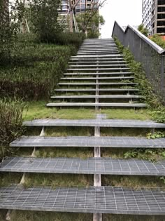 a set of stairs made out of metal grates