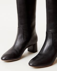 Tall shaft boot with mid-heel in black soft calf leather. Padded footbed with gold stamped logo. Almond toe, pulls on. 2 inch heel. Flat Tall Black Boots, Black Tall Boots, Black Boots Tall, Tall Boot, Loeffler Randall, 2 Inch Heels, New Sneakers, Leather Pieces, Sport Sandals