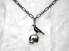 This necklace is great for Halloween.  It is a black crow sitting on top of a silver skull.  The chain is black and is adjustable from 18 to 19.5 inches. Crow Sitting, Halloween Necklace, Black Crow, Black Chain, Necklace Gift, Pendant Necklaces, Dream Closet, Jewelry Necklace Pendant, Beauty Book