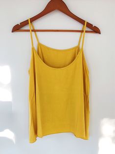 This amazing strap-y A-line tank is REVERSIBLE. Score! 1 tank, 2 ways to wear! Wear it tucked, as a layering piece, frontwards or 'reversed' for different looks. 100% Rayon Hand-wash cold Hang Dry Witch Fashion, Hanging Dryer, 2 Way, Layering Pieces, Wear It, Camisole Top, Layering, Mango, A Line