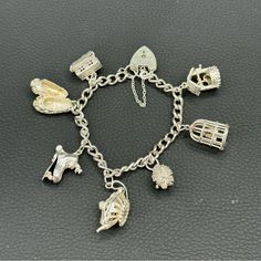 1950’s Vintage English Sterling Silver 925 Charms Bracelet Antique Piece With 7 Large Charms The Charm Bracelet Padlock Is Stamped With Clear English Hallmarks I Am Not The Original Owner, So I Do Not Know The Story. This Piece Was Purchased At An Estate Sale. They Sell Elsewhere For More Than My Price, Around $1,000, So My Price Is Firm Sterling Silver Charms, Sterling Silver Charm Bracelet, Charms Bracelet, 1950s Vintage, Sterling Silver Charm, Silver Charms, Estate Sale, Womens Jewelry Bracelets, Silver 925