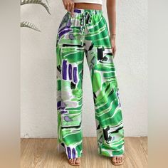 Condition: Brand New, Unused. Color: Multicolor Style: Casual Pattern Type: All Over Print Type: Wide Leg Details: Knot Closure Type: Elastic Waist Waist Line: Hight Waist Length: Long Fit Type: Loose Fabric: Non-Stretch Material: Fabric Composition: 100% Polyester Care Instructions: Machine Wash Green Drawstring Pants For Vacation, Casual Purple Beach Bottoms, Casual Purple Pants For Spring, Green Drawstring Bottoms For Vacation, Green Vacation Bottoms With Drawstring, Green Drawstring Vacation Bottoms, Trendy Green Beach Pants, Purple High Waist Bottoms For Vacation, Purple Beach Pants For Spring