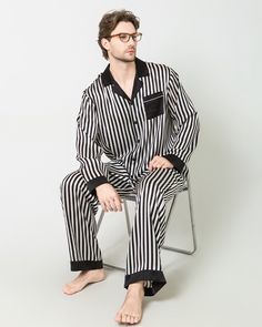 Type: Men's 2-piece silk pajama setMaterial: 19 Momme Charmeuse Silk. Details:Featuring a timeless black and white striped pattern. Crafted from the finest silk, this ensemble offers the perfect blend of comfort and style for a tranquil night's rest. The long-sleeved shirt showcases a classic yet contemporary black and white stripe print, adding a touch of refined charm to your sleepwear collection. Paired with matching long pants, this set ensures a snug and comfortable fit throughout the night Nye 2025, Black And White Striped Pants, Men Pajamas, Striped Pajamas, How To Wash Silk, Baddie Vibes, Silk Pajama, Silk Pajama Set, Mens Stripes