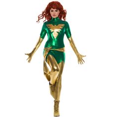 a woman in a green and gold costume with her arms outstretched, standing on one leg