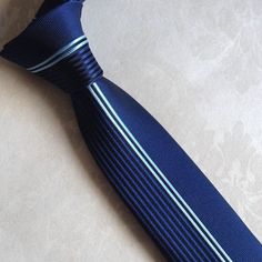 Item Type: TiesPattern Type: PatchworkGender: MaleStyle: FashionMaterial: Polyester, Rayon, Wool, Microfiber Size: 2.2 x 58 inch. (5.5 x 148 cm) Fitted Blue Office Ties, Navy Fitted Tie For Office, Fitted Blue Standard Tie, Luxury Ties, Mens Luxury, Vertical Stripes, Size 2, Stripes, Wool