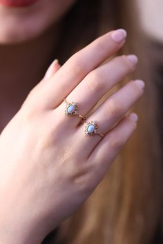 "Blue - White Opal Ring / 14k - 18k Gold Opal Ring / Opal Ring / Blue - White Gold Opal Ring ❥ ITEM DETAILS ---> Gold Color of Choice : Yellow Gold, Rose Gold, White Gold ---> Material : 14k ( 585 ) or 18k ( 750 ) Real Gold. It is not gold filled or gold plated ---> Made to order ---> Size of the face: 15 x 12 mm ---> Opal size: 7 x 5 mm ---> Band Thickness : 1.10 mm ---> Band Width : 1.35 mm ---> Gemstone : Opal ( middle ), Zircon ( sides ). Opal is real ❥ Gift Wrapping White Gold Opal Ring, Evil Eye Ring Gold, Gold Opal Ring, Dainty Gold Ring, Gold Ring Wedding, Handmade Evil Eye, Evil Eye Necklace Gold, White Opal Ring, Dainty Gold Rings