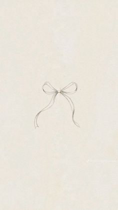 a drawing of a bow on a white paper