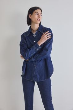 From laid-back weekends to casual outings, this tunic embodies effortless elegance. Revel in the sophistication of denim and embrace a look that effortlessly balances comfort and style. Oversized fit Collared Lightweight fabric Tunic style Oversized Denim Top For Everyday, Classic Everyday Denim Top, Denim Blue Relaxed Fit Top For Everyday, Classic Oversized Denim Tops, Classic Long Sleeve Denim Top For Everyday, Relaxed Fit Washed Indigo Denim Top, Chic Washed Blue Relaxed Fit Denim Top, Indigo Washed Denim Top With Relaxed Fit, Classic Everyday Denim Top For Fall