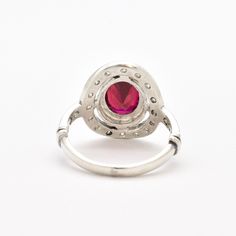 Vintage Ruby Ring set with a Created Ruby in a top grade, perfect diamond cut & flawless clarity, at 10x8mm size (3 Cts). Solid 925 Sterling Silver ☞ made to last. Click here for ☞ Matching Pendant﻿Matching Earrings ☞ please ask meDetails:• Created Ruby in a flawless clarity • Ruby: 10x8mm, 3 Cts, diamond cut • Dimensions: Band width ≈ 2.1mm, thickness ≈ 1.1mm • Solid 925 Sterling Silver SKU 2550 Elegant Ruby Ring With Halo Setting, Diamond White Ruby Ring With Center Stone, Elegant Ruby Ring With Halo Setting In Platinum, Ruby Rings With Brilliant Cut In Diamond White, Brilliant Cut Ruby Rings In Diamond White, Elegant Ruby Rings With Brilliant Cut, Formal Sterling Silver Open Halo Ring, Elegant Platinum Ruby Ring With Halo Setting, Formal Ruby Ring With Cubic Zirconia In Round Band