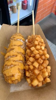 two different types of food sitting in a box