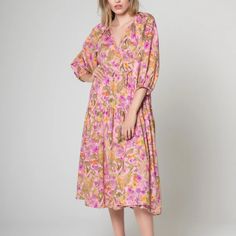 Nwot Lavender Brown Floral Printed Midi Wrap Dress Size M Color: Orchet Pink What Could Be More Enchanting Than A Sun-Drenched Day Spent In The Company Of Flowers? With Its Lovely Floral Print, Our Airy Cotton Lawn Midi Wrap Dress Is Perfect For Just Such An Occasion. The ¾ Puff Sleeve Adds A Touch Of Charming Detail, While The Wrap Style Ensures A Flattering Fit. 100% Cotton Made In The Usa Length - 43” Mauve Floral Print Summer Dress, Pink Floral Print Midi Dress For Spring, Mauve Floral Print Dress For Garden Party, Spring Floral Print Mauve Dress, Mauve Floral Print Midi Dress, Pink Floral Print Midi Dress For Garden Party, Flowy Mauve Floral Print Dress, Feminine Pink Floral Print Midi Dress, Mauve V-neck Midi Dress For Spring