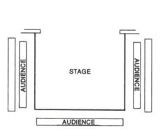 the stage for an audience is shown in black and white, as well as three columns