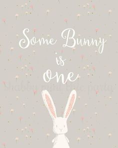 some bunny is one on a gray background with pink flowers