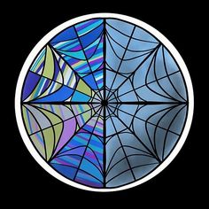 a circular stained glass window with three different colors