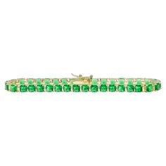 Don't be green with envy... add this gorgeous green tennis bracelet to your daily wrist line up. 14k gold plated sterling silver Square emerald crystals 7.25" in length Formal Green Emerald Cut Tennis Bracelet, Formal Green Emerald-cut Tennis Bracelet, Emerald Cut Green Tennis Bracelet For Formal Events, Emerald-cut Green Tennis Bracelet For Formal Occasions, Formal Green Cubic Zirconia Tennis Bracelet, Green Cubic Zirconia Tennis Bracelet For Formal Occasions, Green Prong Setting Bracelet, Classic Green Emerald Tennis Bracelet, Classic Green Tennis Bracelet With Prong Setting