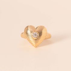 Carrying your heart on your fingers, literally. The solid gold textured heart ring is equally dreamy and bold. The diamond in the middle is the cherry on top of the piece, it adds that special glow. 14k solid gold Average diamond weight is 0.13cts Heart dimensions: 15 x 16mm Storing Cookies, Sparkling Rings, Cherry On Top, Heart On, Gold Texture, Diamond Sizes, Cute Jewelry, White Diamond, Labour Day