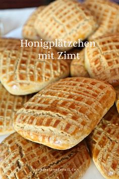 several waffles on a white plate with the words honigplatzchen mit zimt