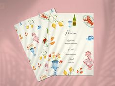 two menus with flowers and vases are on a pink tablecloth against a pale background