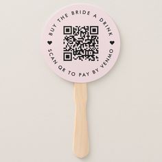 a ping pong paddle with a qr code on it