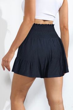 Love skirts but need the comfort and freedom of shorts? Then say hello to the Sawyer Swing Shorts featuring a unique, skirt-like silhouette with a playful ruffle hem and stretchy smocked waist & front tie. These shorts are truly the best of both worlds giving us the freedom & comfort of shorts while maintaining the flirty feminine vibe of a skirt. So go ahead, make a statement in these fun and flirty bottoms. Features: Stretchy Smocked Waist, Ruffle hemline, Front Waist Tie Material composition: Flowy Skirt With Built-in Shorts For Day Out, Casual Tiered Skirt With Built-in Shorts, Stretch Tiered Skirt With Elastic Waistband, Summer Skirt With Wide Waistband And Short Length, Tiered Skirt With Built-in Shorts, Summer Skirt With Wide Waistband And Short Inseam, Flirty Fitted Shorts With Elastic Waistband, Summer Skirted Bottoms With Built-in Shorts, Casual Skirt With Short Inseam And Wide Waistband