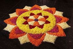 a colorful flower arrangement on the floor